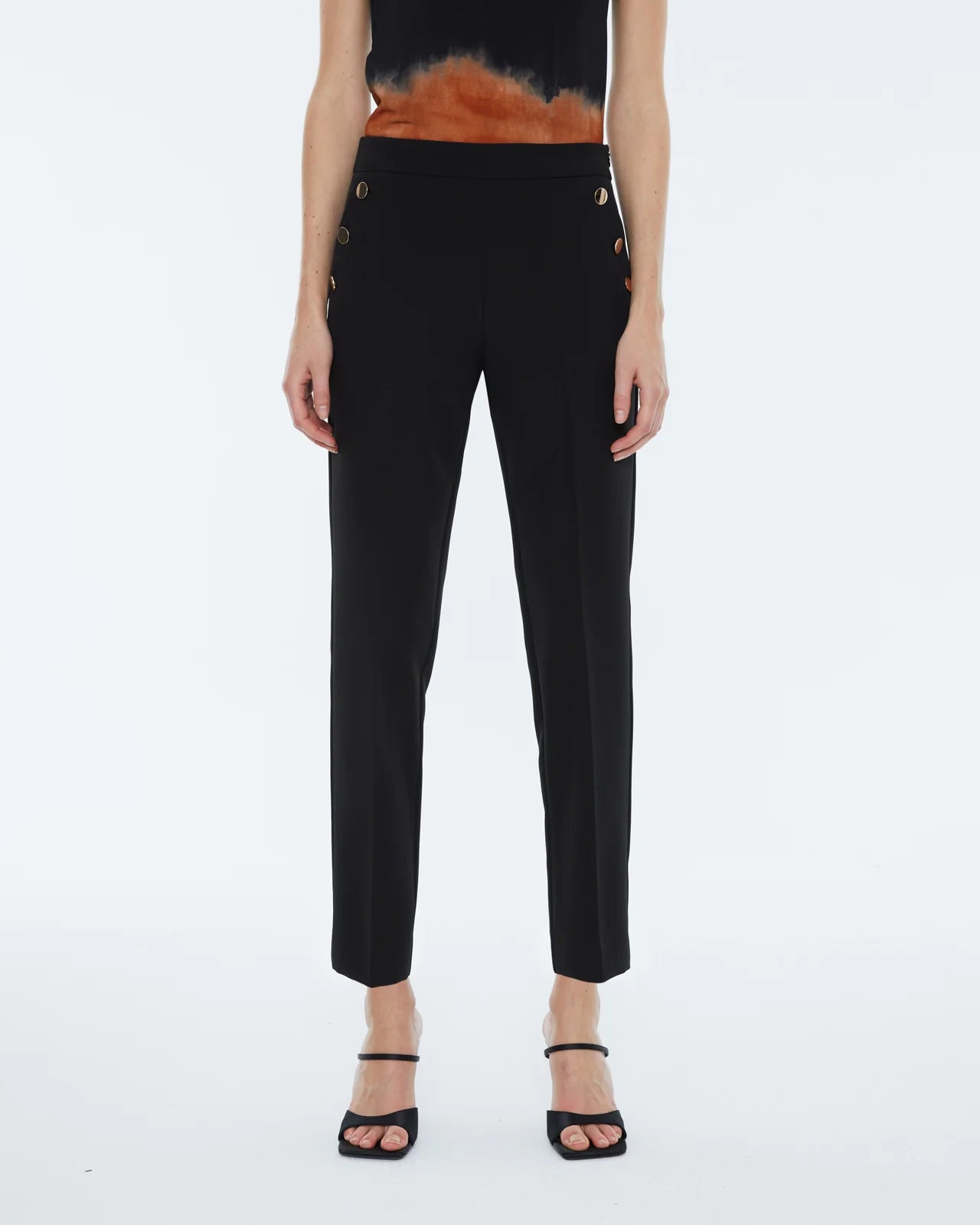 Andam, high-waisted ankle length pants with gold buttons. BLACK