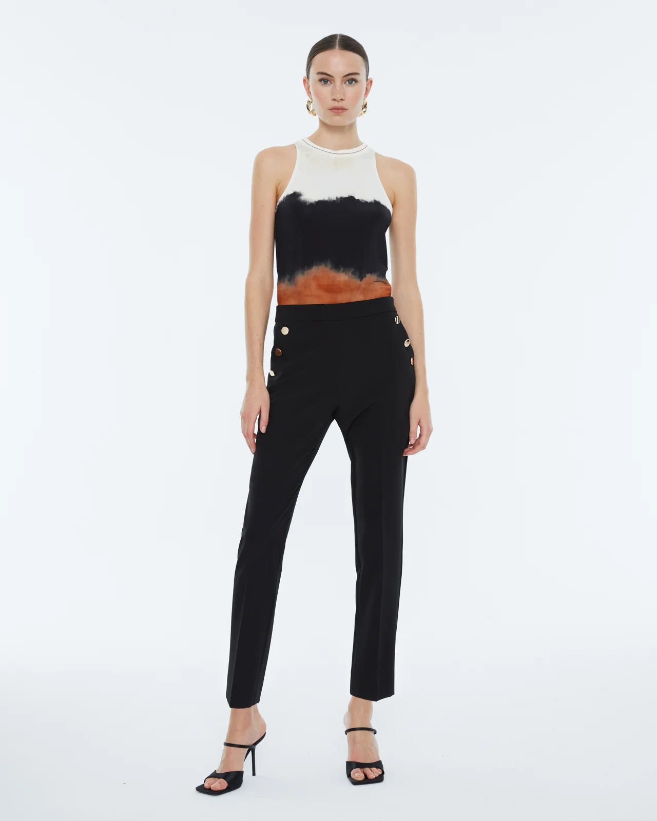 Andam, high-waisted ankle length pants with gold buttons. BLACK