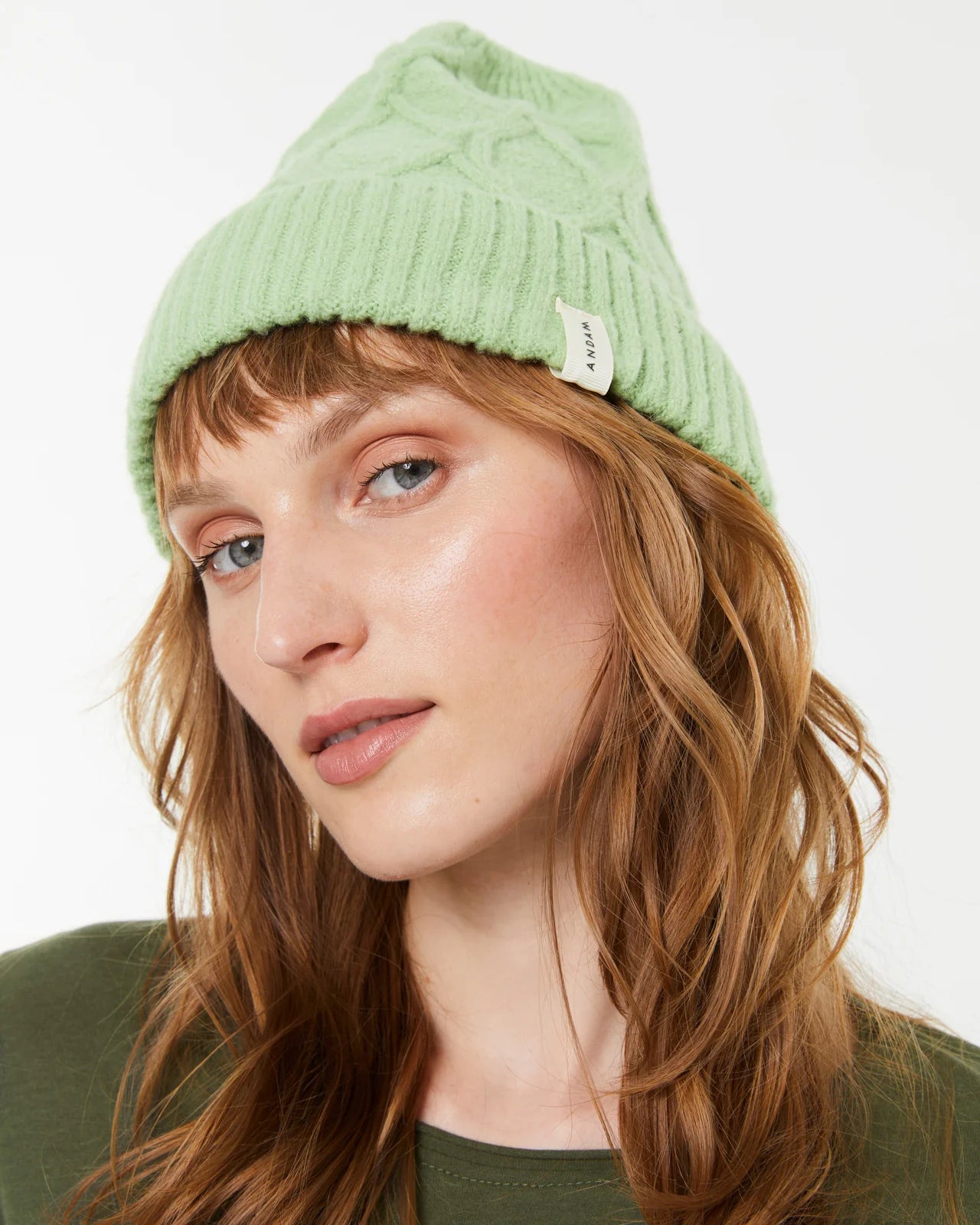 Andam, knitted hat with braided structure Green 0009